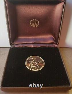 1976 $100 Olympic gold coin 14Kt 1/4 oz gold