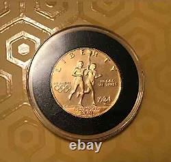 1984 W Commenative U. S. OLYMPICS 1/2 Oz Gold Coin