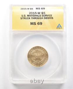 2015-W $5 US Marshals Gold Commemorative Struck Through Debris MS69 ANACS 2956