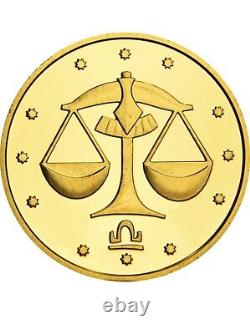 Commemorative gift gold coin Libra in a case. Certificate with 3 signature