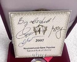 Commemorative gift gold coin Libra in a case. Certificate with 3 signature