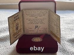 Commemorative gift gold coin Sagittarius in a case with autographed by authors