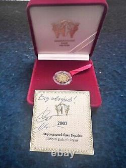 Commemorative gift gold coin Sagittarius in a case with autographed by authors