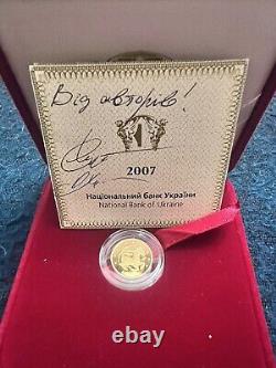 Commemorative gift gold coin Sagittarius in a case with autographed by authors