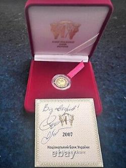 Commemorative gift gold coin Scorpion in a case with autographed from authors